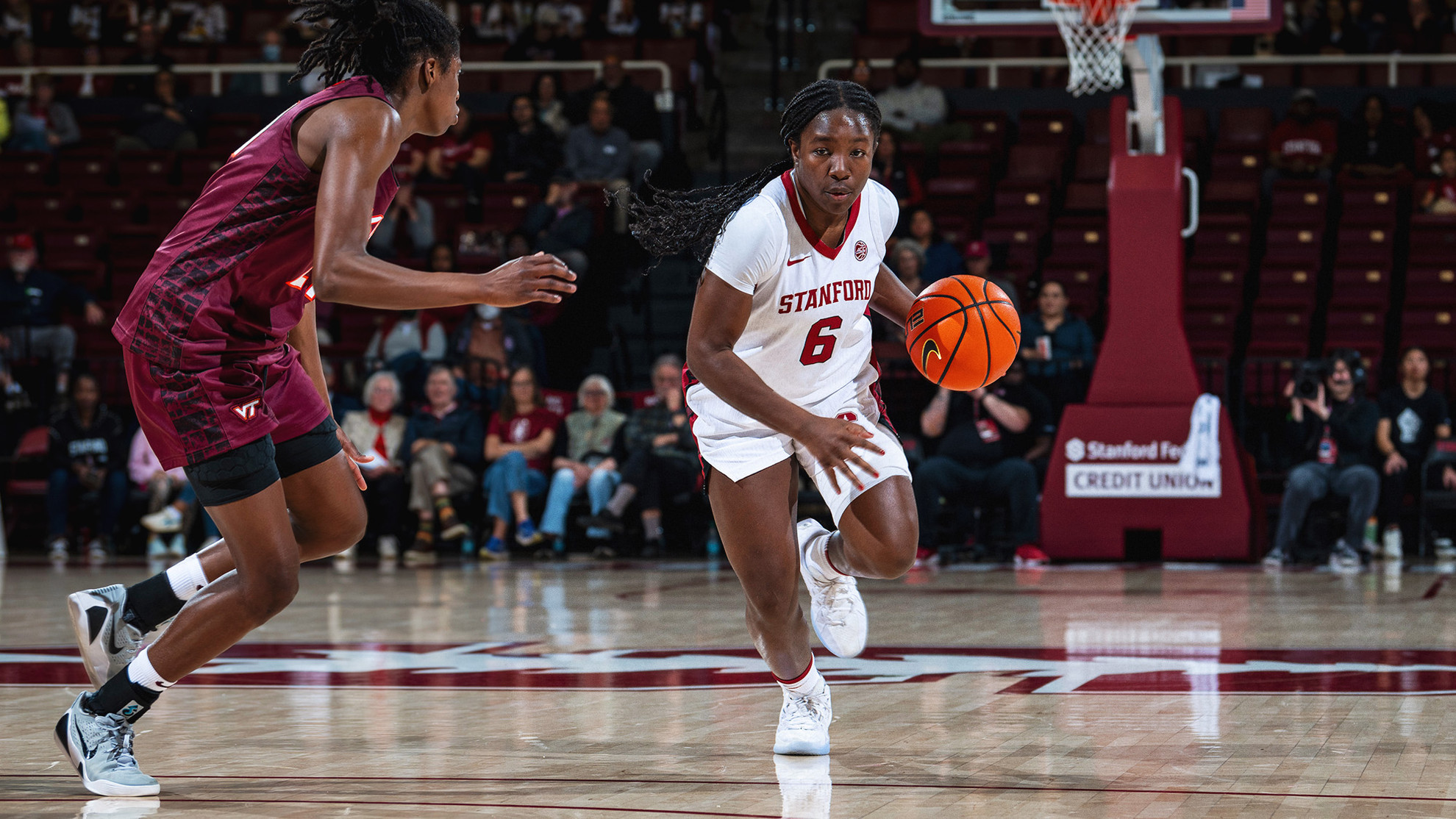 Stanford women's basketball players on court during a televised game